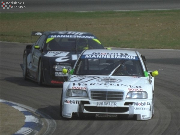 Juan Pablo Montoya (Mercedes) and Manuel Reuter (Opel Calibra)